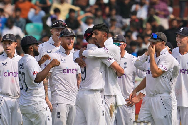 Shoaib Bashir, centre, made an impact on his Test debut (Manish Swarup/AP)
