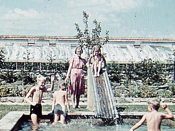 Hoss’s children play in the pool at Villa Rainer