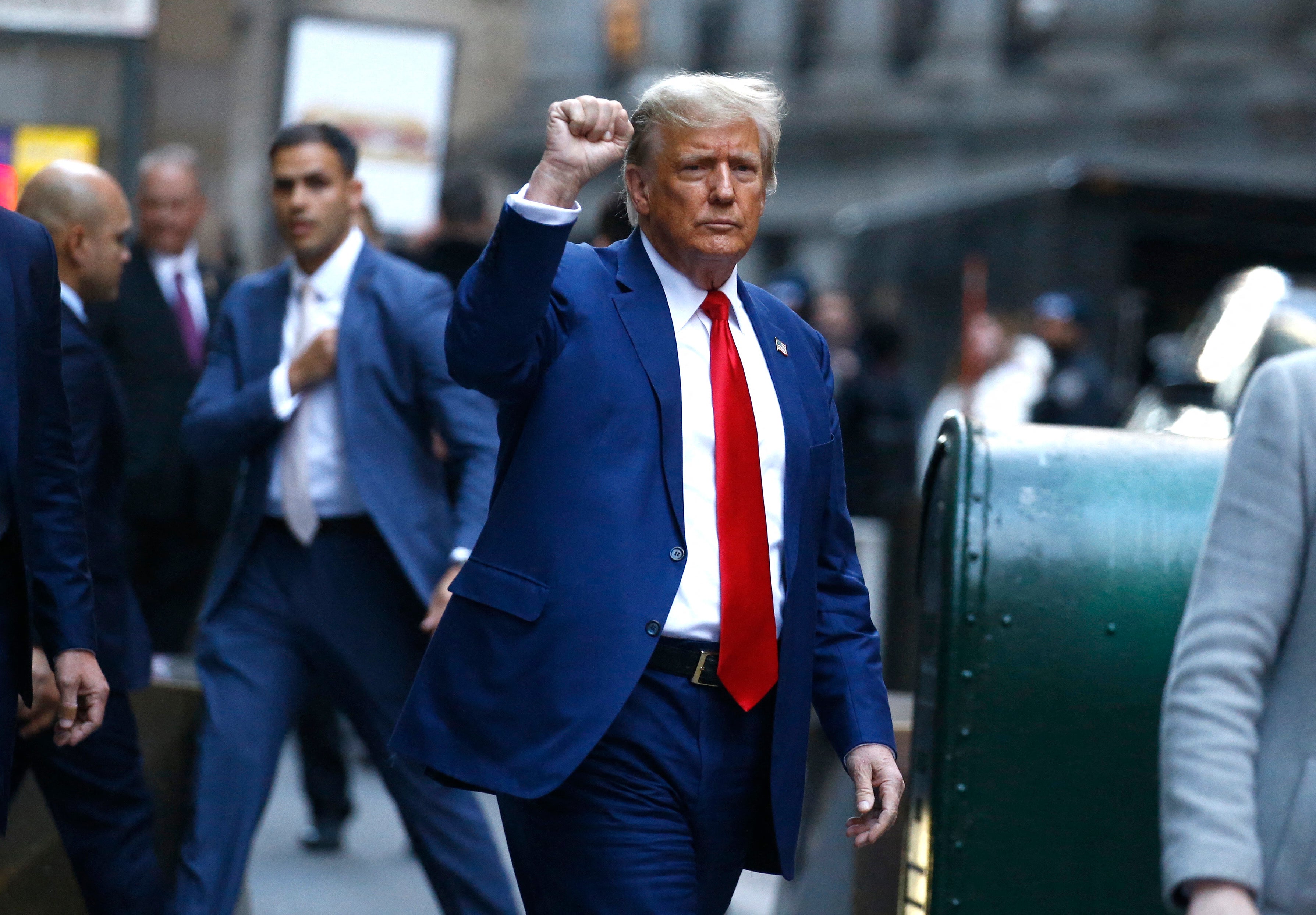 Donald Trump leaves his civil fraud trial on 11 January in New York