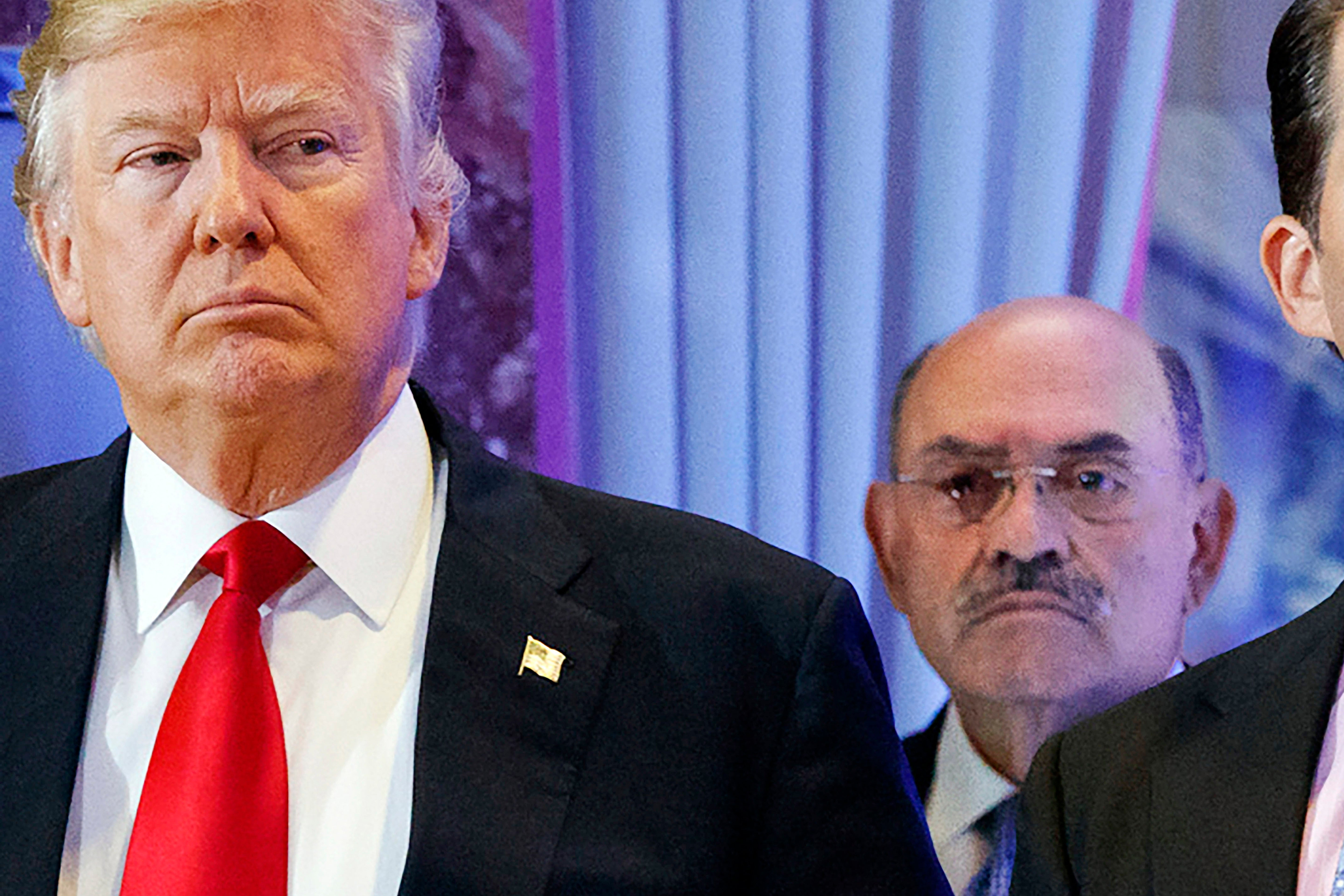 Allen Weisselberg stands next to Donald Trump in 2017