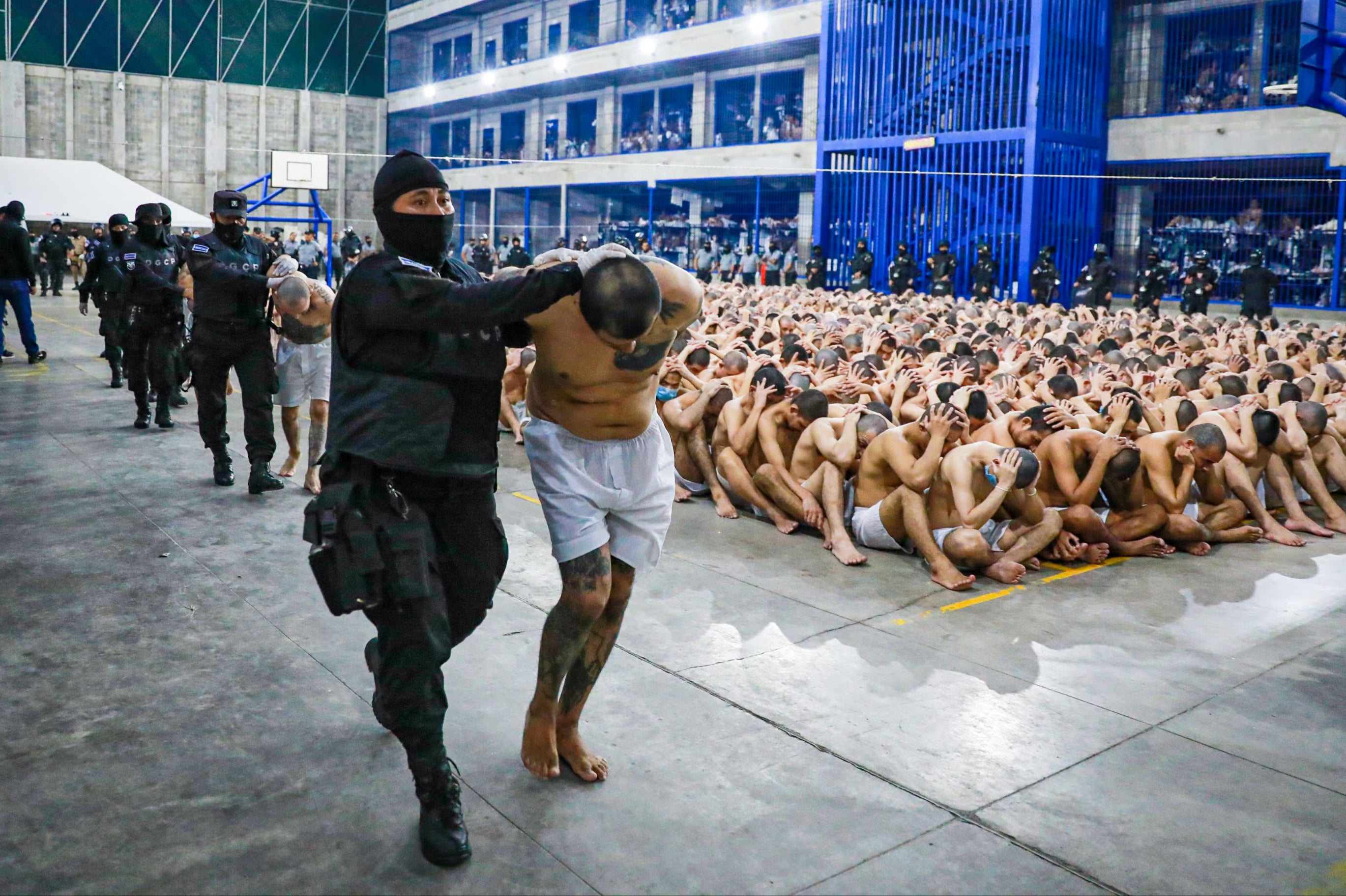 Police inspect a prison in San Salvador, where gang members serve their sentences