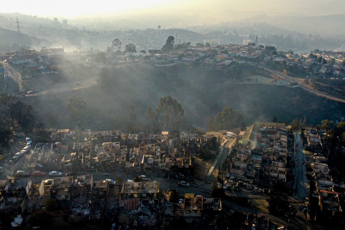 At least 19 dead as forest fires approach densely populated areas of central Chile