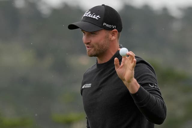 Wyndham Clark gestures after making a birdie putt on the 18th hole at Pebble Beach Golf Links during the third round of the AT&T Pebble Beach National Pro-Am golf tournament in California (Ryan Sun, AP)