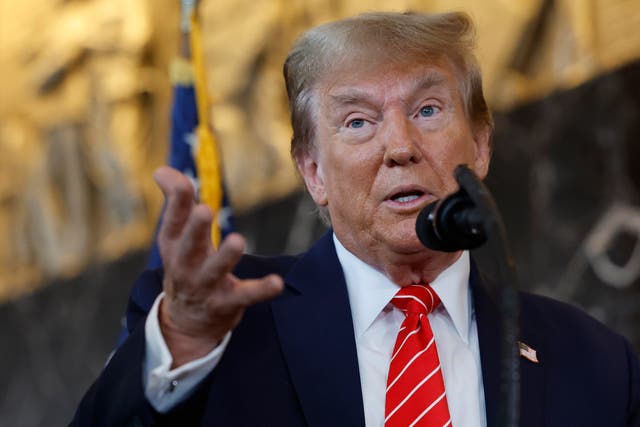 <p> Republican presidential candidate and former US president Donald Trump talks  reporters at the International Brotherhood of Teamsters headquarters on 31 January 2024 in Washington, DC</p>