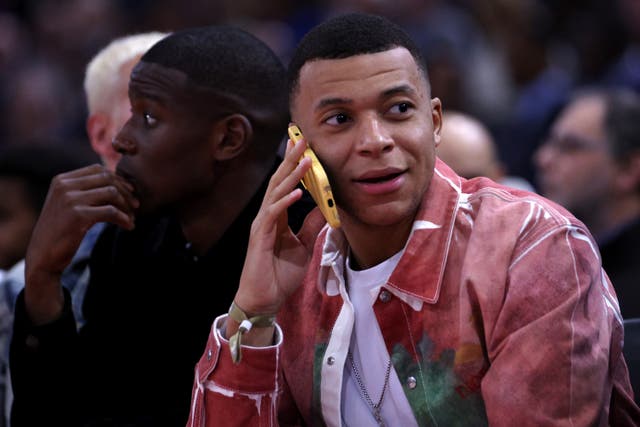 <p>Kylian Mbappe attends an NBA match between the Brooklyn Nets and Cleveland Cavaliers in Paris</p>