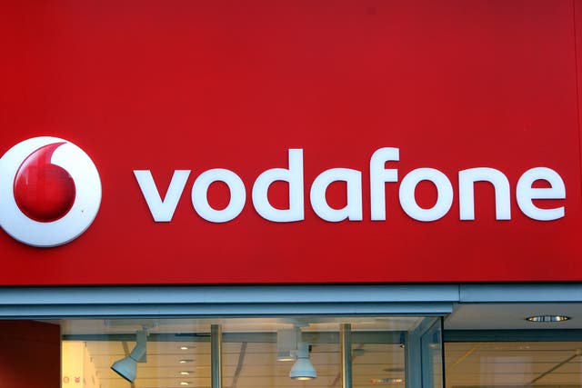 Vodafone has revealed an increase in UK sales after the group won more mobile and broadband customers (Paul Faith/PA)
