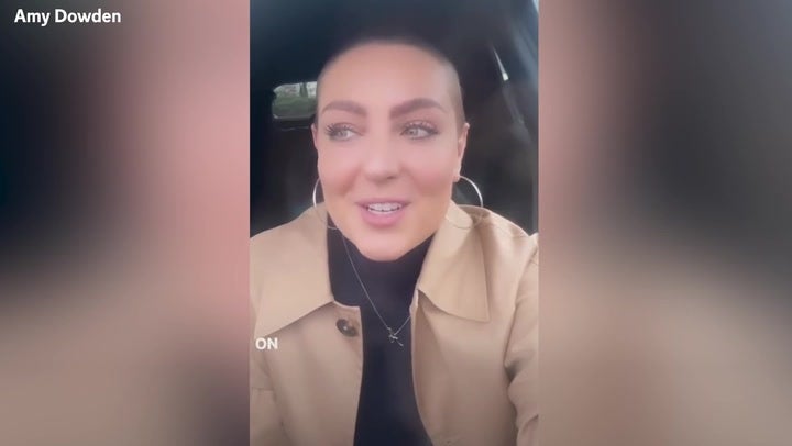 <p>Amy Dowden shows off hair growth as she returns to hospital.</p>