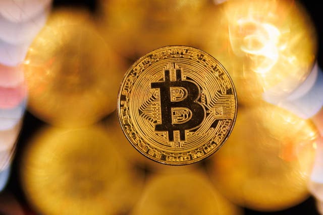<p>A visual representation of the cryptocurrency bitcoin is seen on 9 January, 2024 in London, England</p>