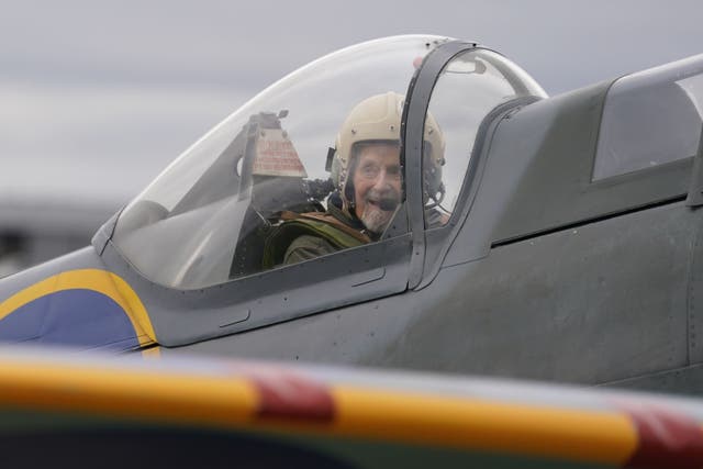 102-year-old Jack Hemmings AFC after flying a Spitfire plane to mark 80th anniversary of the military charity Mission Aviation Fellowship (Gareth Fuller/PA)