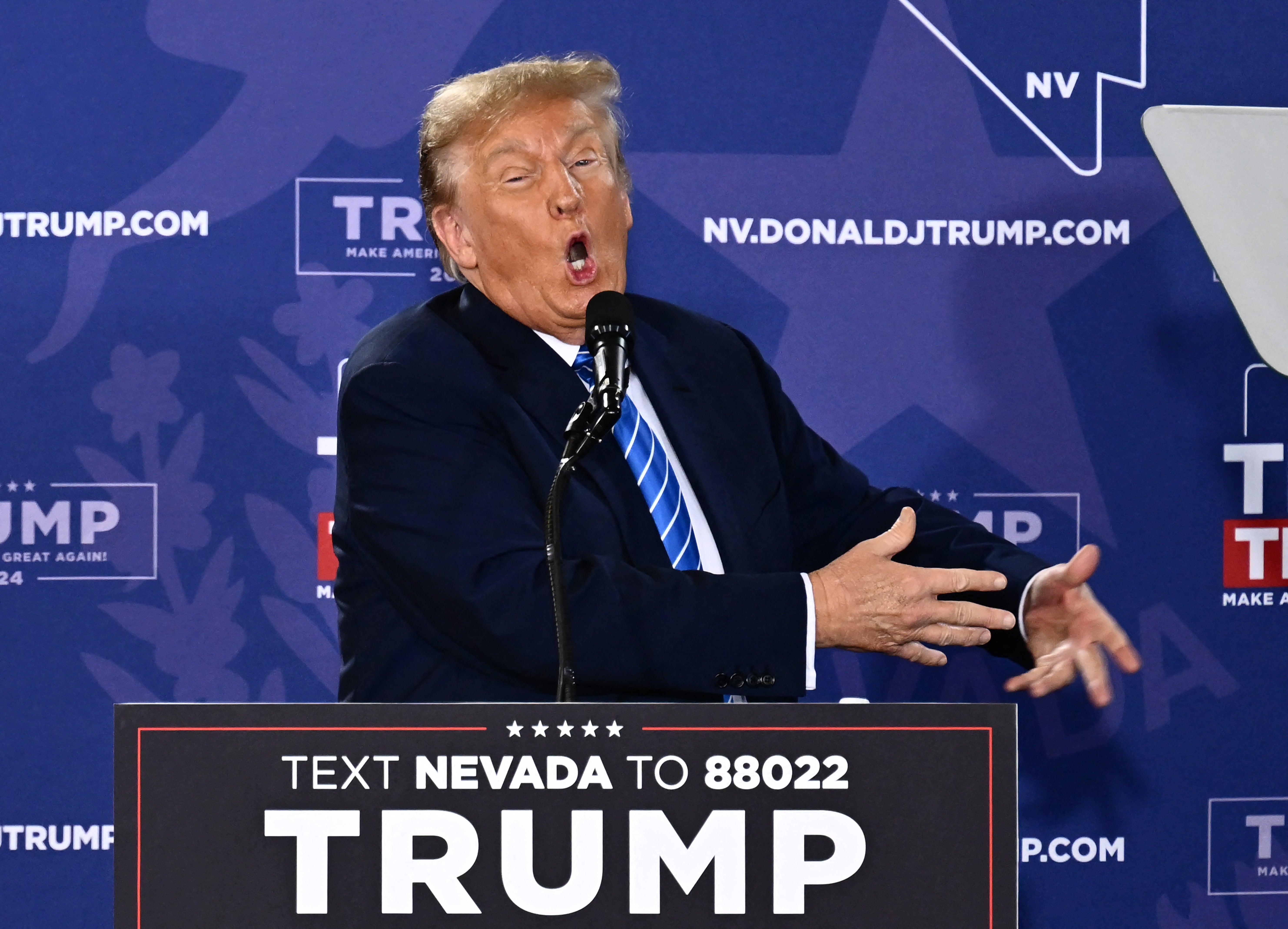 Former US President and 2024 presidential hopeful Donald Trump speaks at a Commit to Caucus Rally in Las Vegas