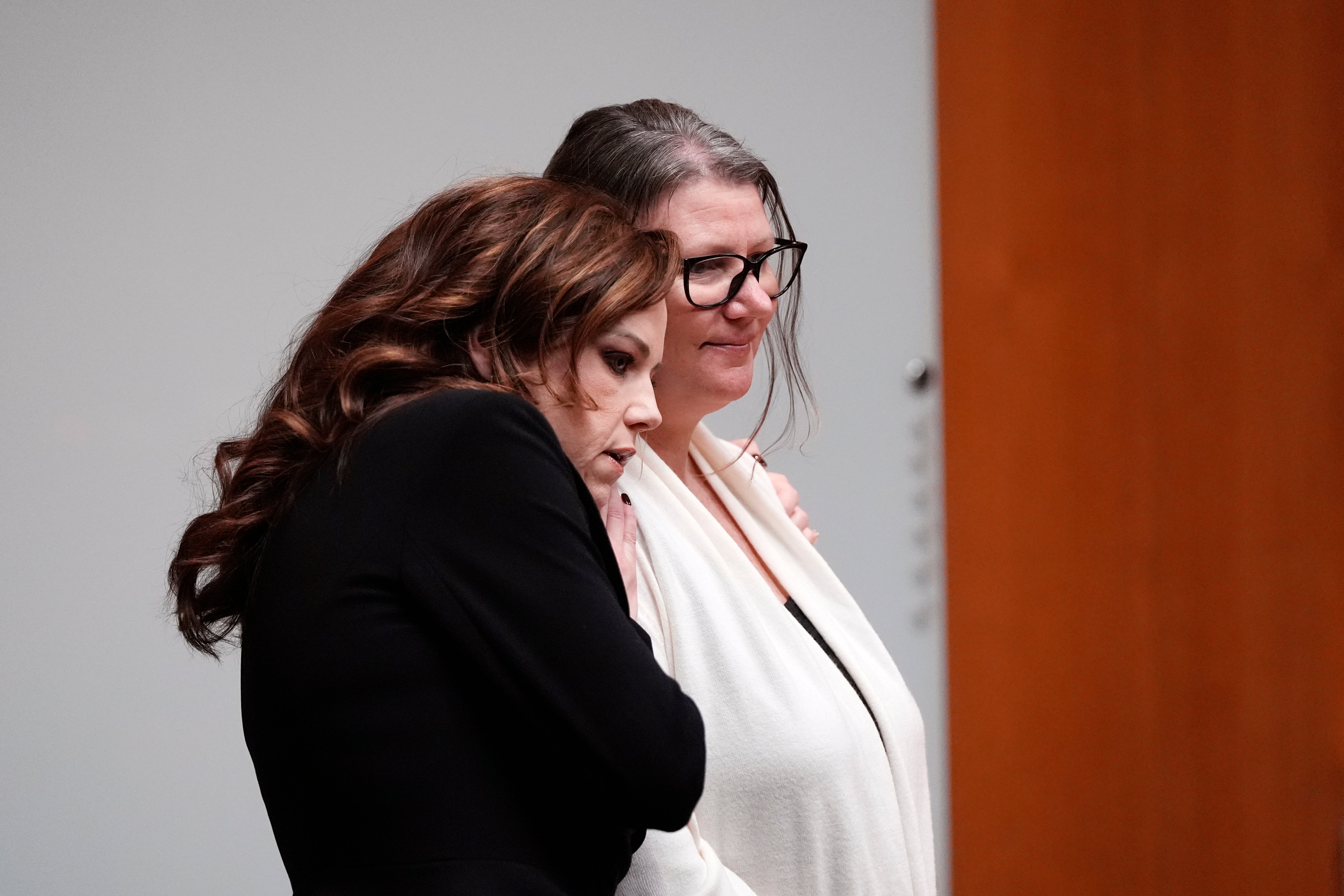 Attorney Shannon Smith hugs Jennifer Crumbley in court on 5 February