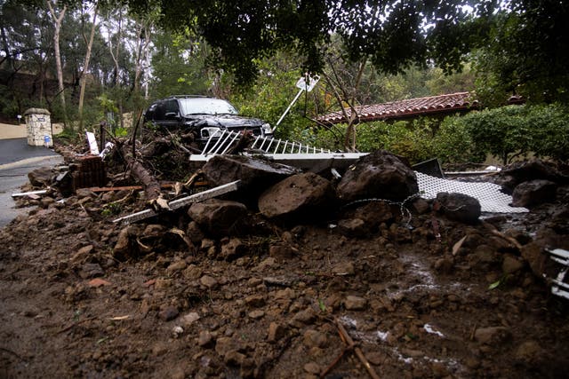 <p>A car sits on top of a pile of debris during a rain storm in Studio City, California, U.S., February 5, 2024</p>