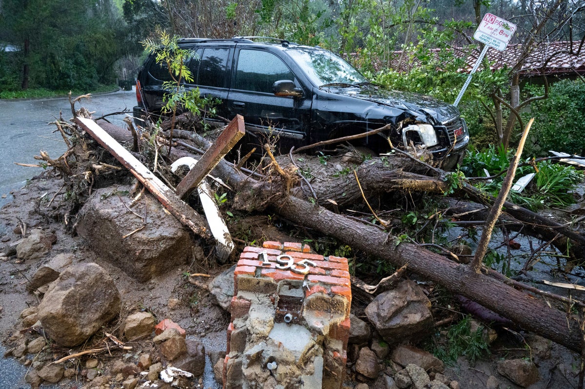 At least three killed as historic storm sweeps California leaving up to $11bn trail of damage