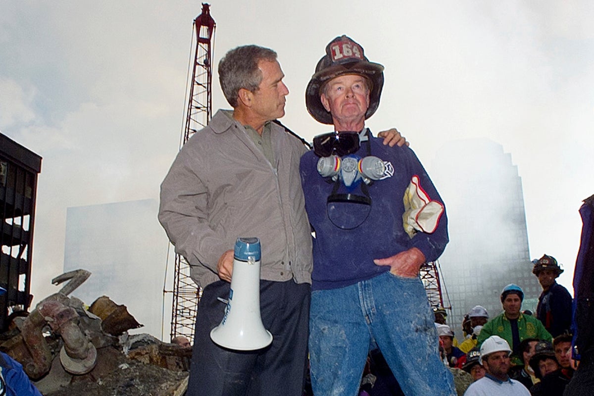 Hero 9/11 firefighter who stood next to George Bush at Ground Zero dies aged 91