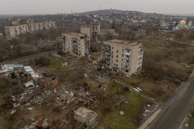 <p>File: Aerial view shows residential buildings destroyed by shelling in Kharkiv region amid the Russian invasion of Ukraine</p>