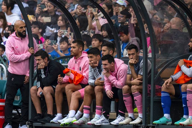 <p>Inter Miami’s Lionel Messi, sixth from left, looks on from the bench during the friendly football match between Hong Kong Team and US Inter Miami CF at the Hong Kong Stadium in Hong Kong</p>