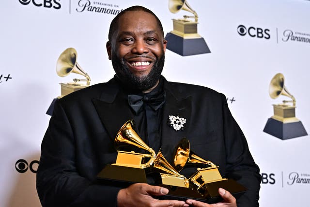 <p>Killer Mike with his three Grammys just before getting arrested</p>