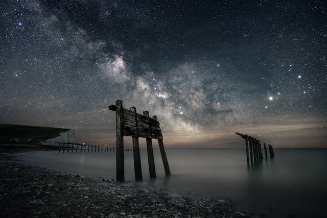 Galactic Bay by Giles Embleton-Smith was the winner of the Starry Skyscapes category in the South Downs National Park astrophotography competition (Giles Embleton-Smith/SDNPA/PA)