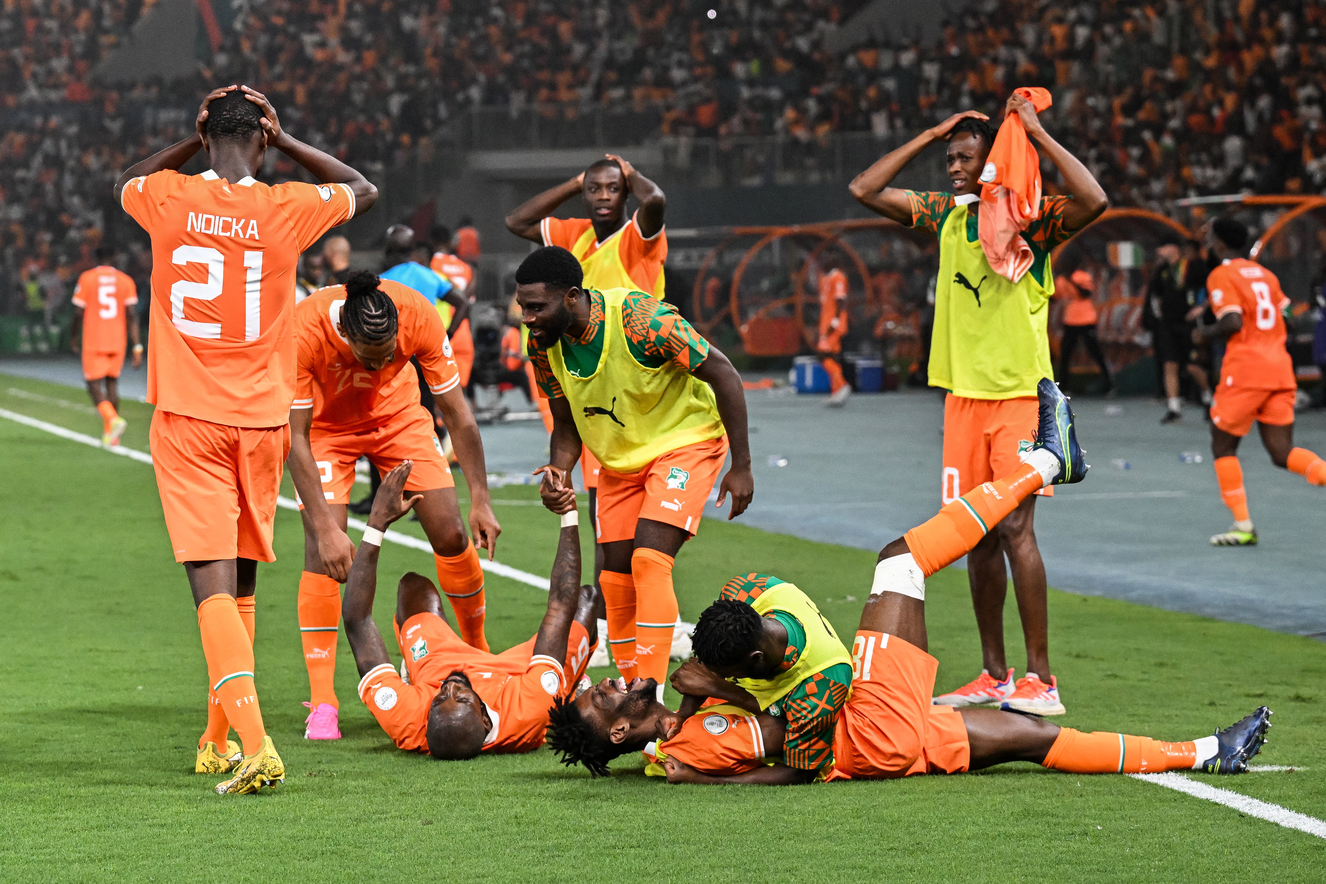 A 120th-minute quarter-final winner against Mali is celebrated by incredulous Ivory Coast players