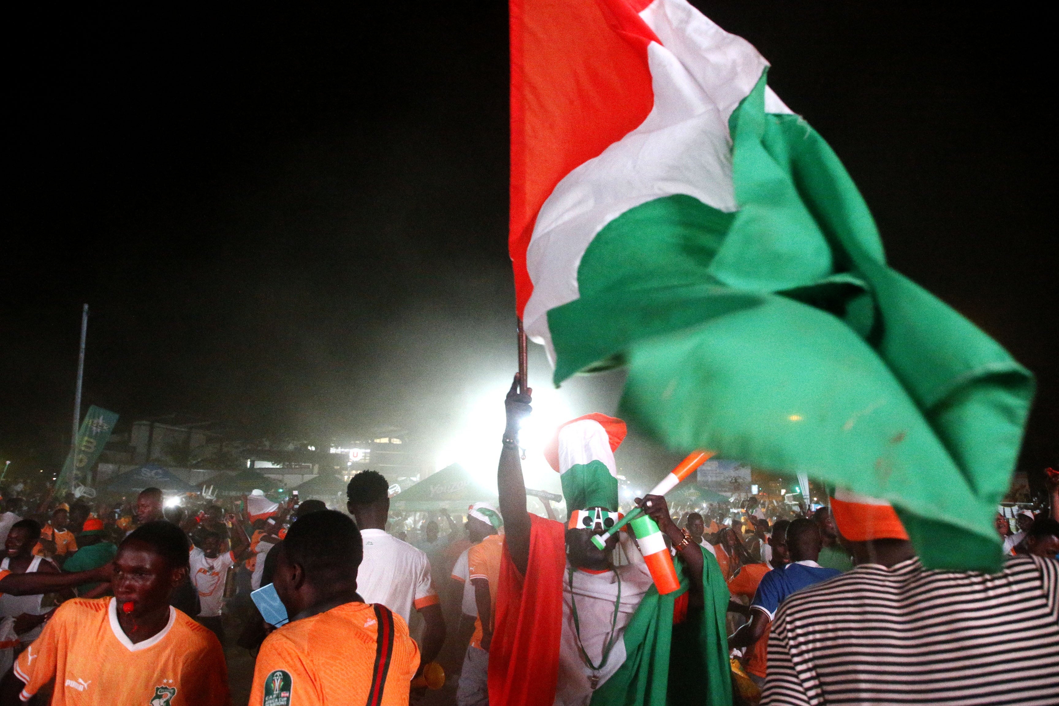 Ivory Coast fans celebrate reaching the semis