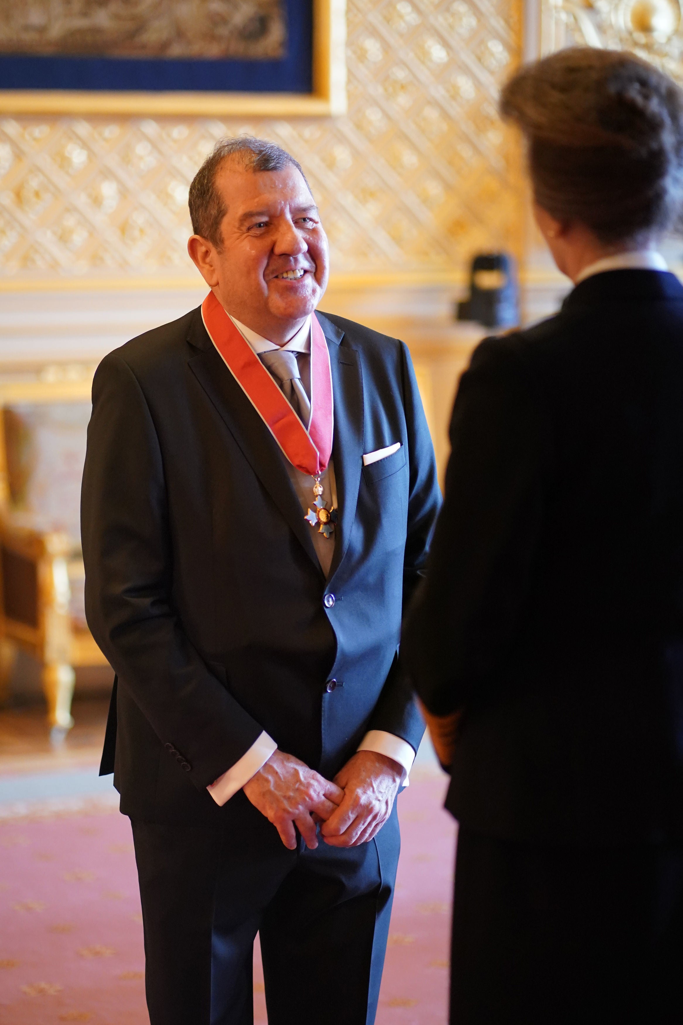 Ivor Bolton, from London, Conductor, is made a Commander of the Order of the British Empire by the Princess Royal at Windsor Castle