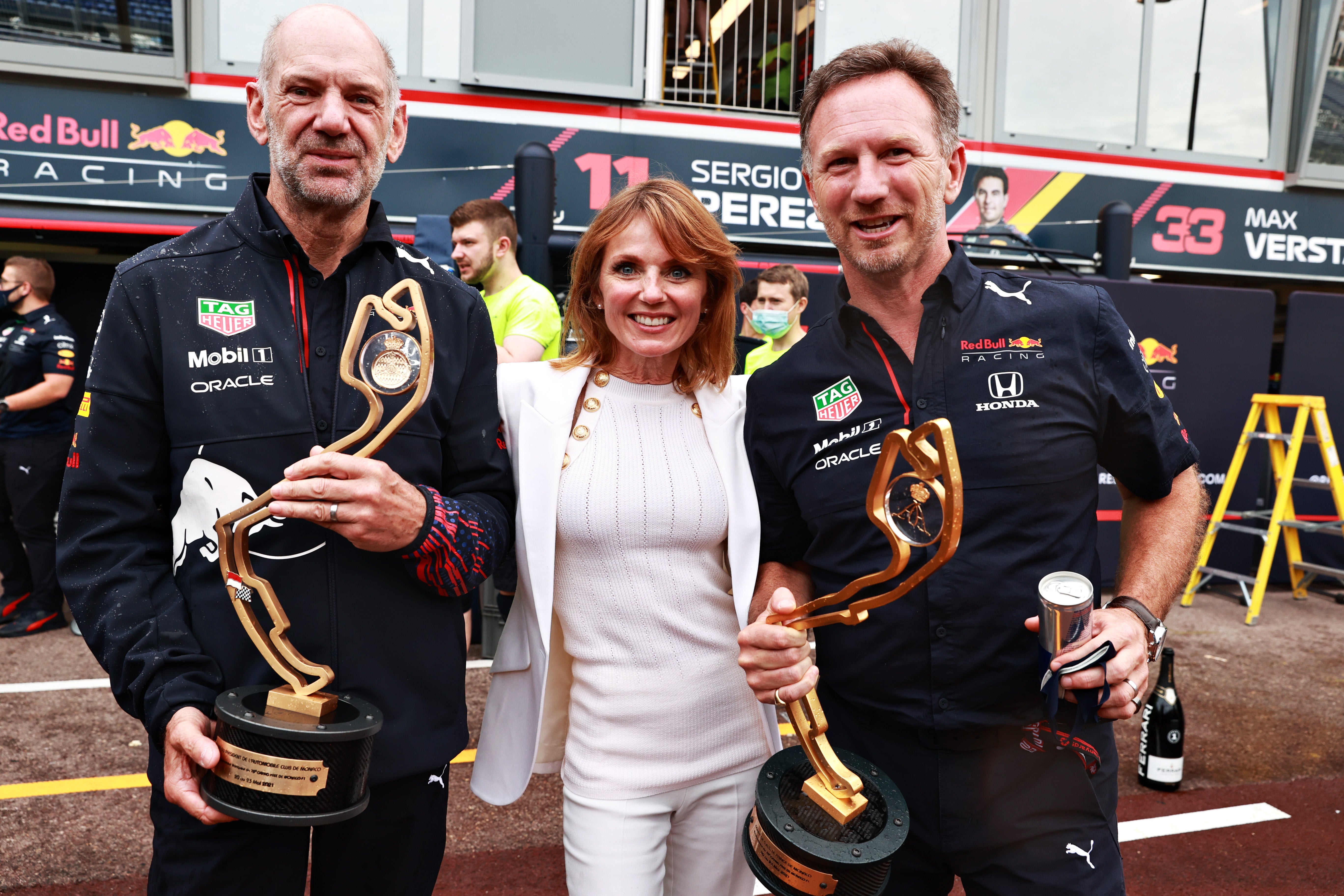 Horner celebrates victory in Monaco in 2021 with wife Geri and Adrian Newey (left)