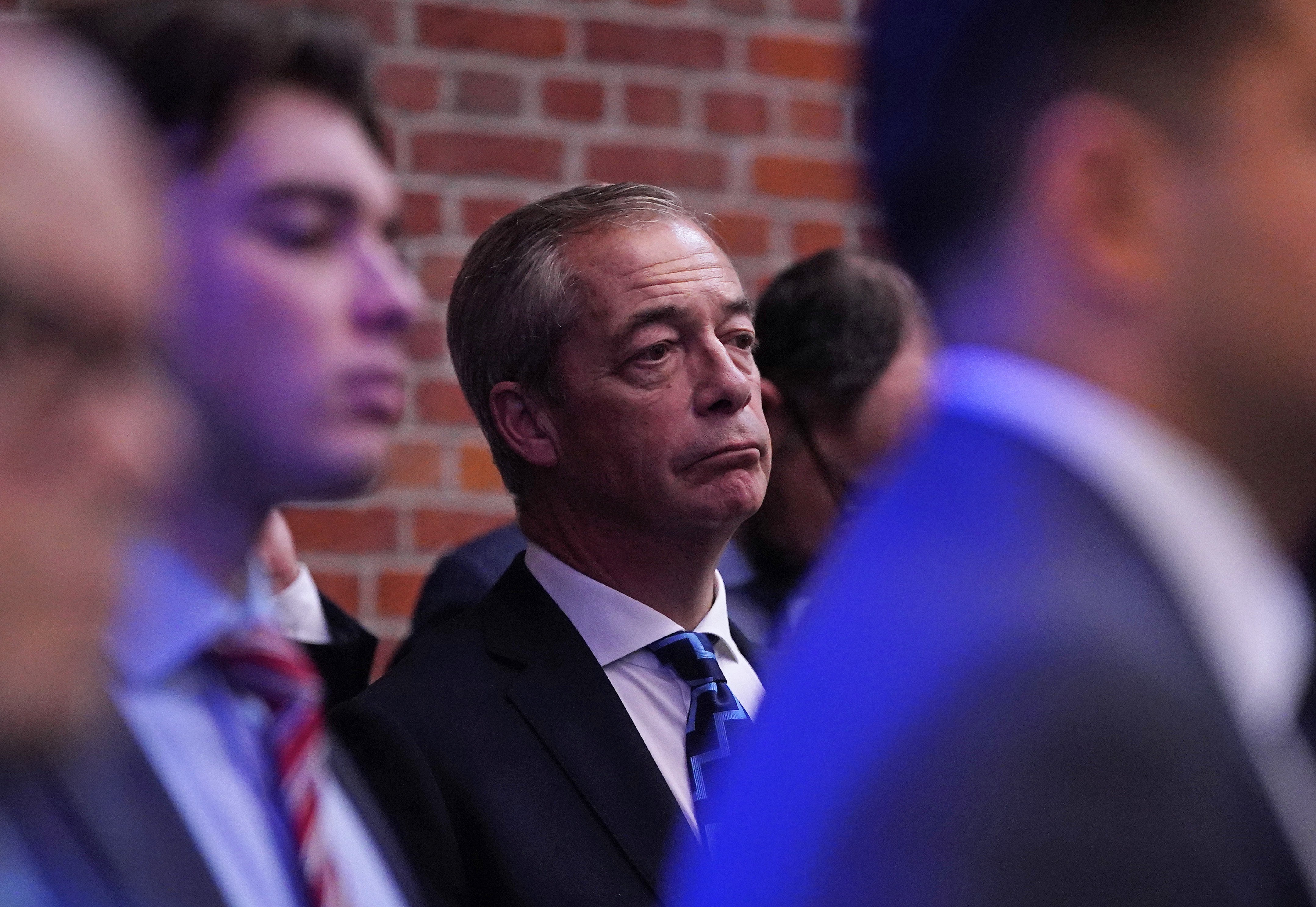 Nigel Farage listens to Tory speakers at the Popular Conservatism launch