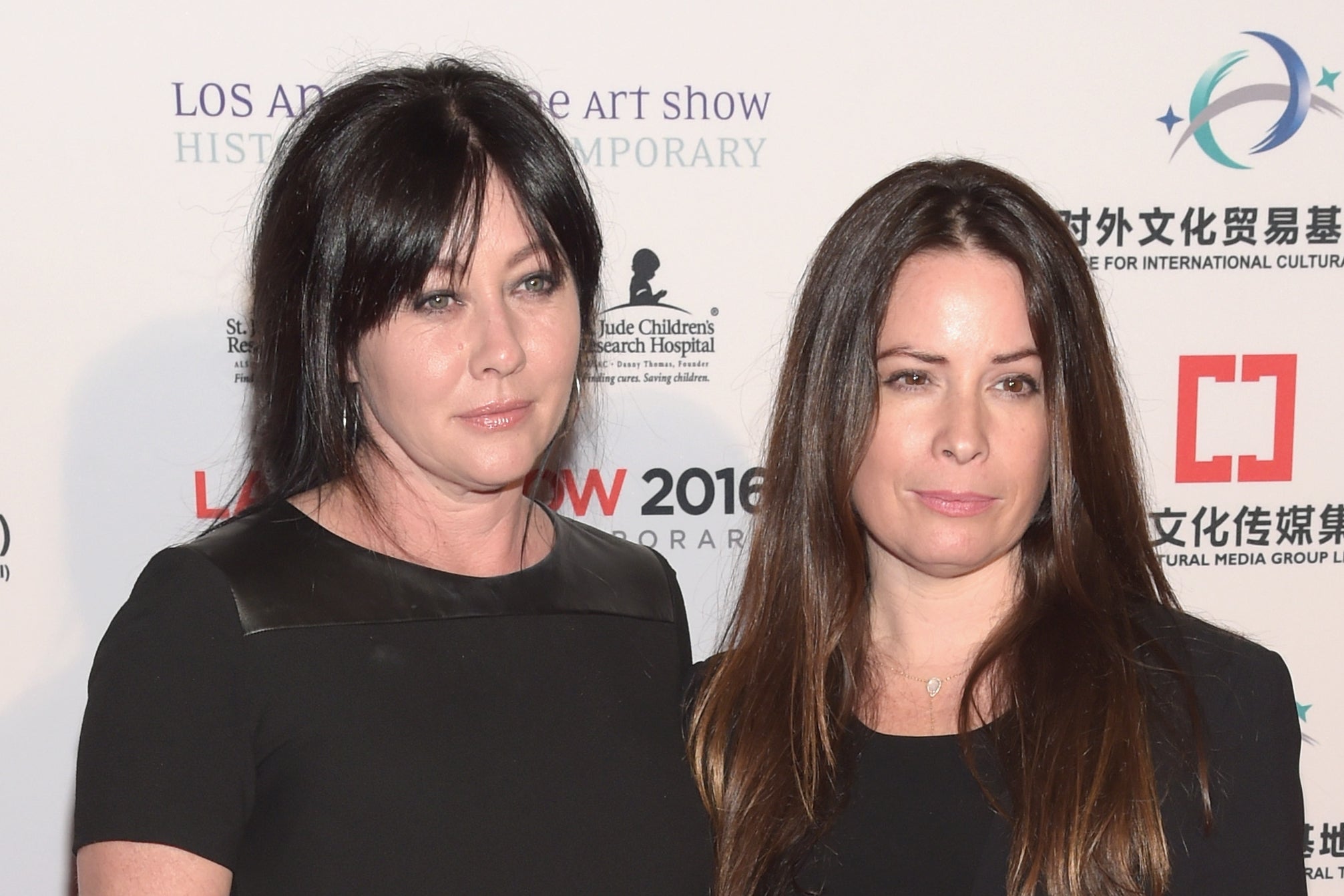 Shannen Doherty and Holly Marie Combs, pictured in 2016, have remained close friends since starring in Charmed together