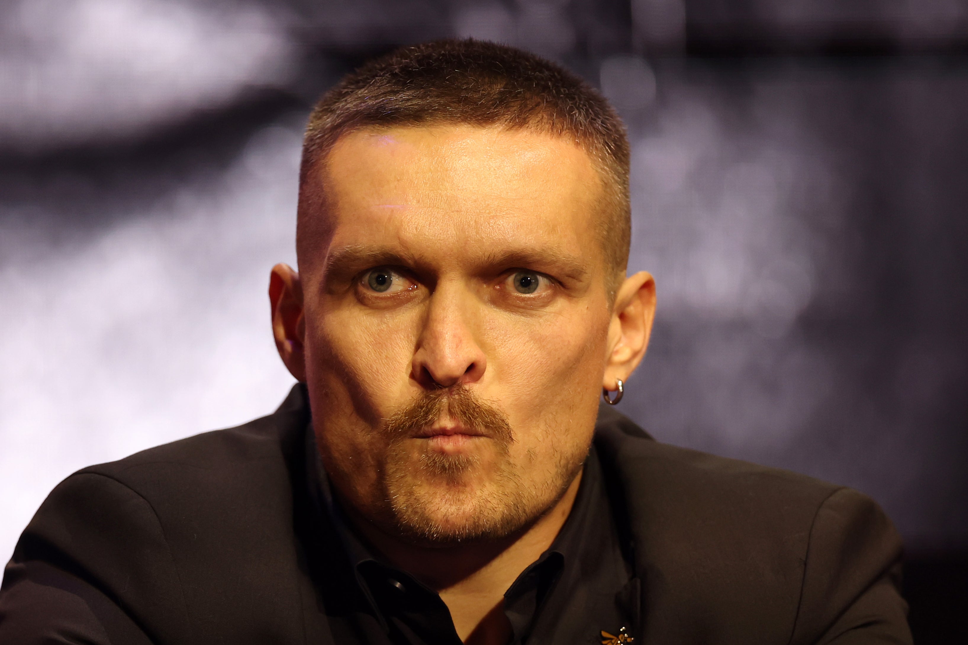 Oleksandr Usyk at the press conference for his postponed fight with Tyson Fury