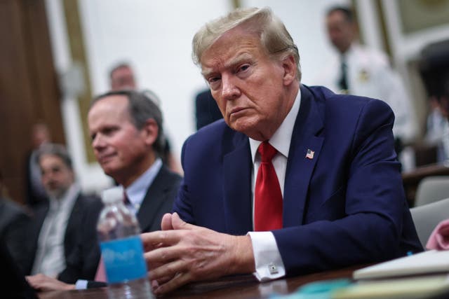 <p>Former US President Donald Trump looks on during the civil fraud trial against the Trump Organization on 7 December 2023</p>
