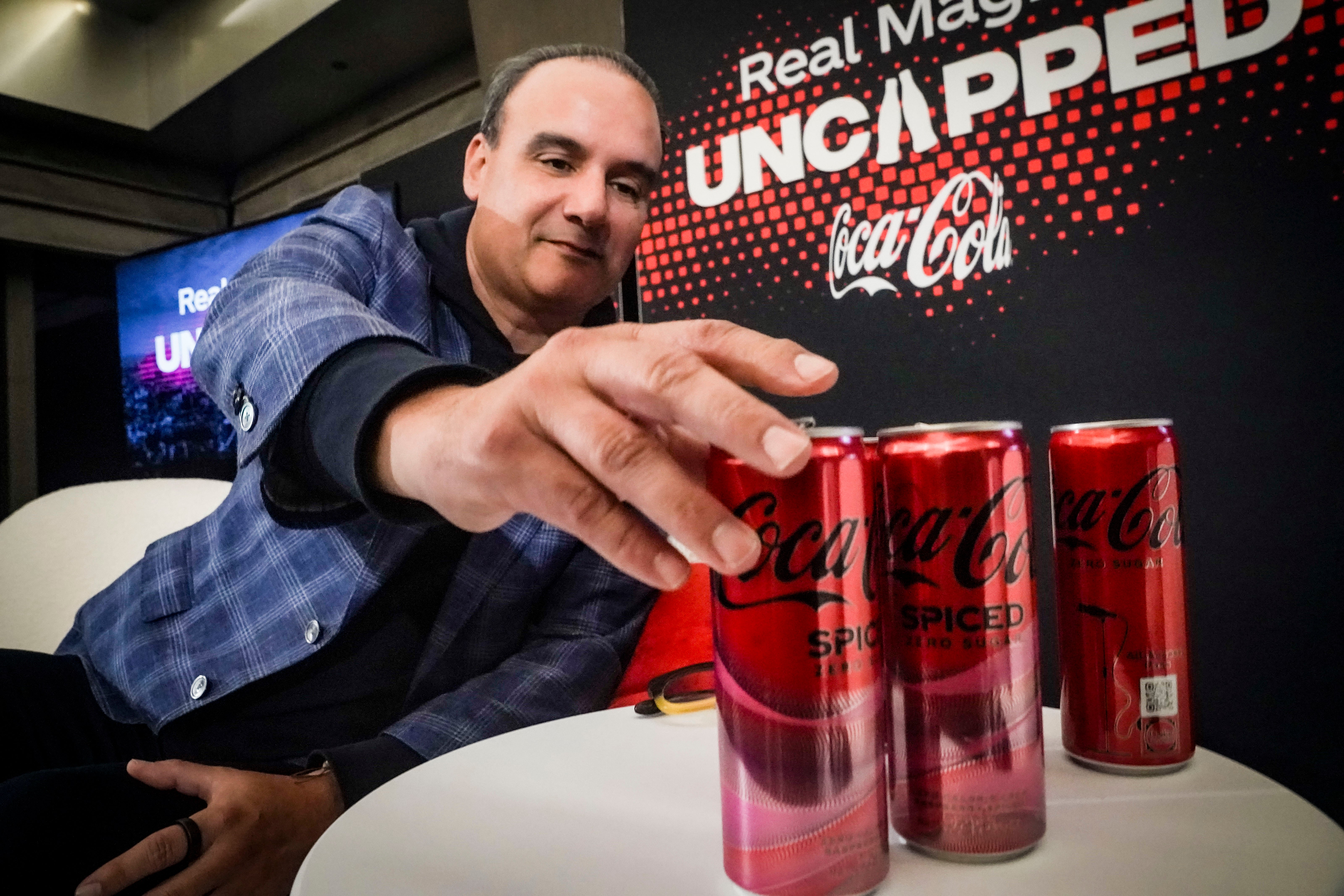 Selman Careaga, president of Coca-Cola’s Global Category, reaches for Coca-Cola Spiced