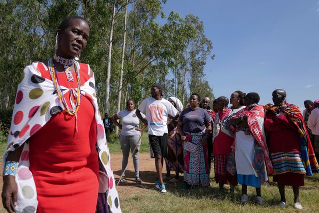 <p>Family and friends gather to mourn Anthony Shungea Pasha who was killed by hyenas while he was collecting firewood at a forest neighbouring his homestead, in Kajiado, Kenya Tuesday</p>