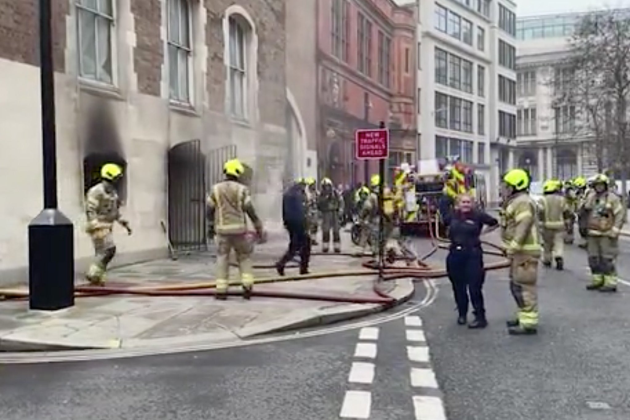Firemen at the Old Bailey following a fire in an electrical substation