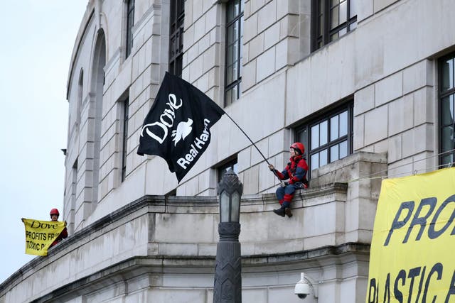 The protest comes ahead of Unilever publishing its full-year results for 2023 on Thursday (Kristian Buus/Greenpeace)