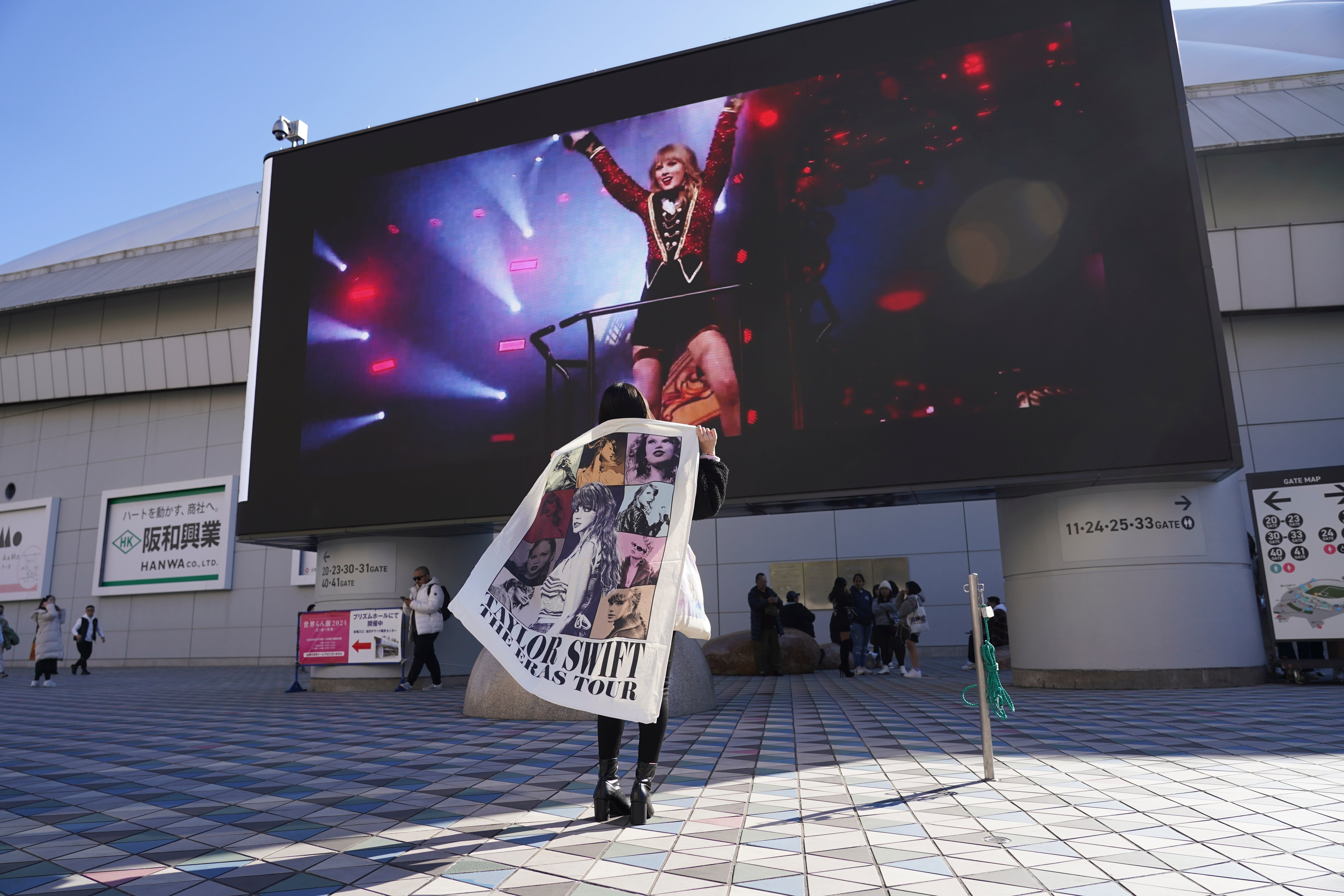 A fan arrives at the Tokyo Dome, for the Taylor Swift concert, as part of the ‘Eras Tour’ on 7 February