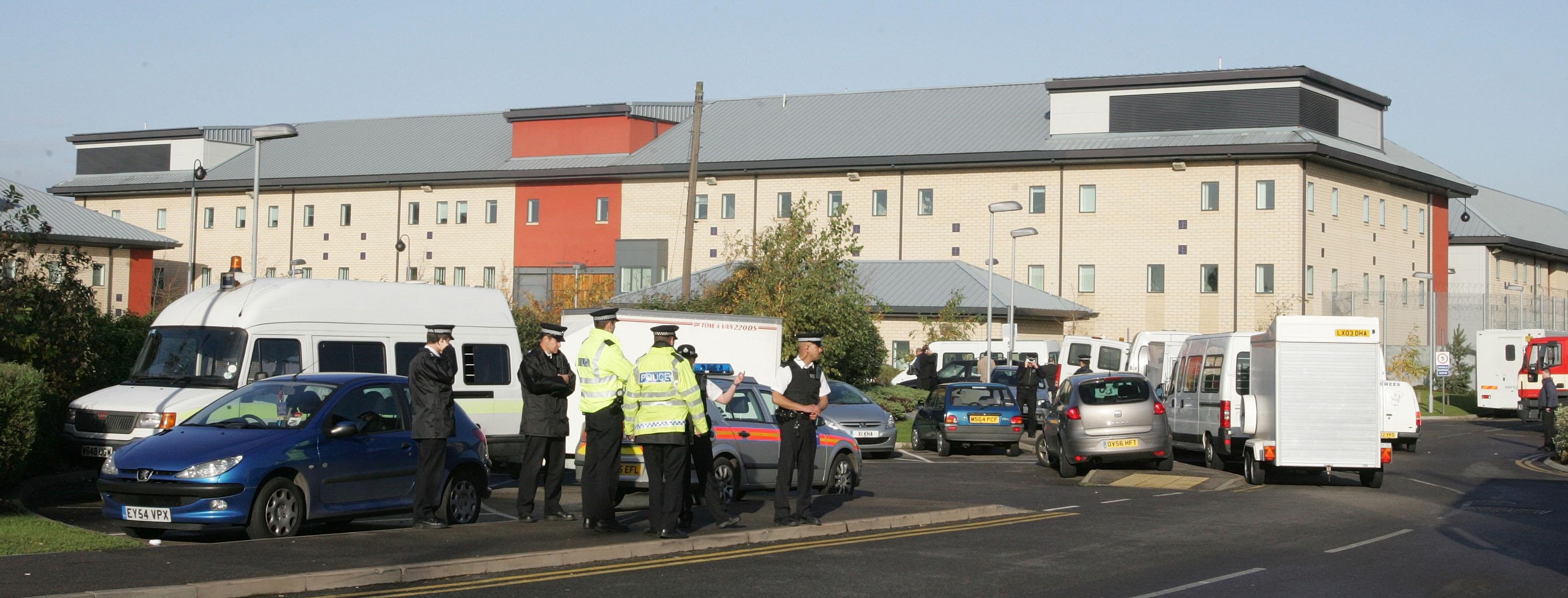 <p>Police outside Harmondsworth immigration detention centre near Heathrow</p>