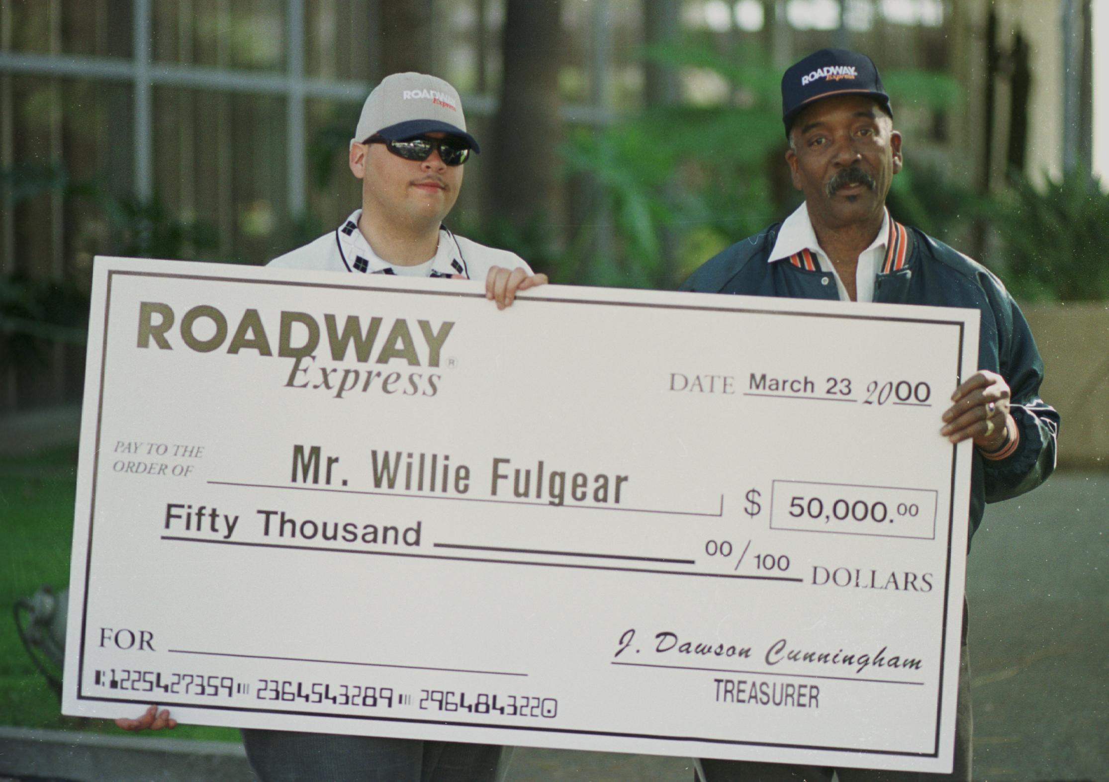 Fulgear with his cheque