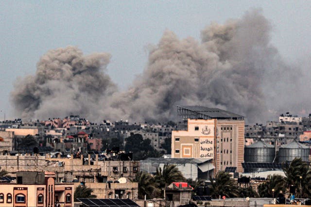 <p>Smoke rises from southern Gaza in the wake of Israeli airstrikes</p>