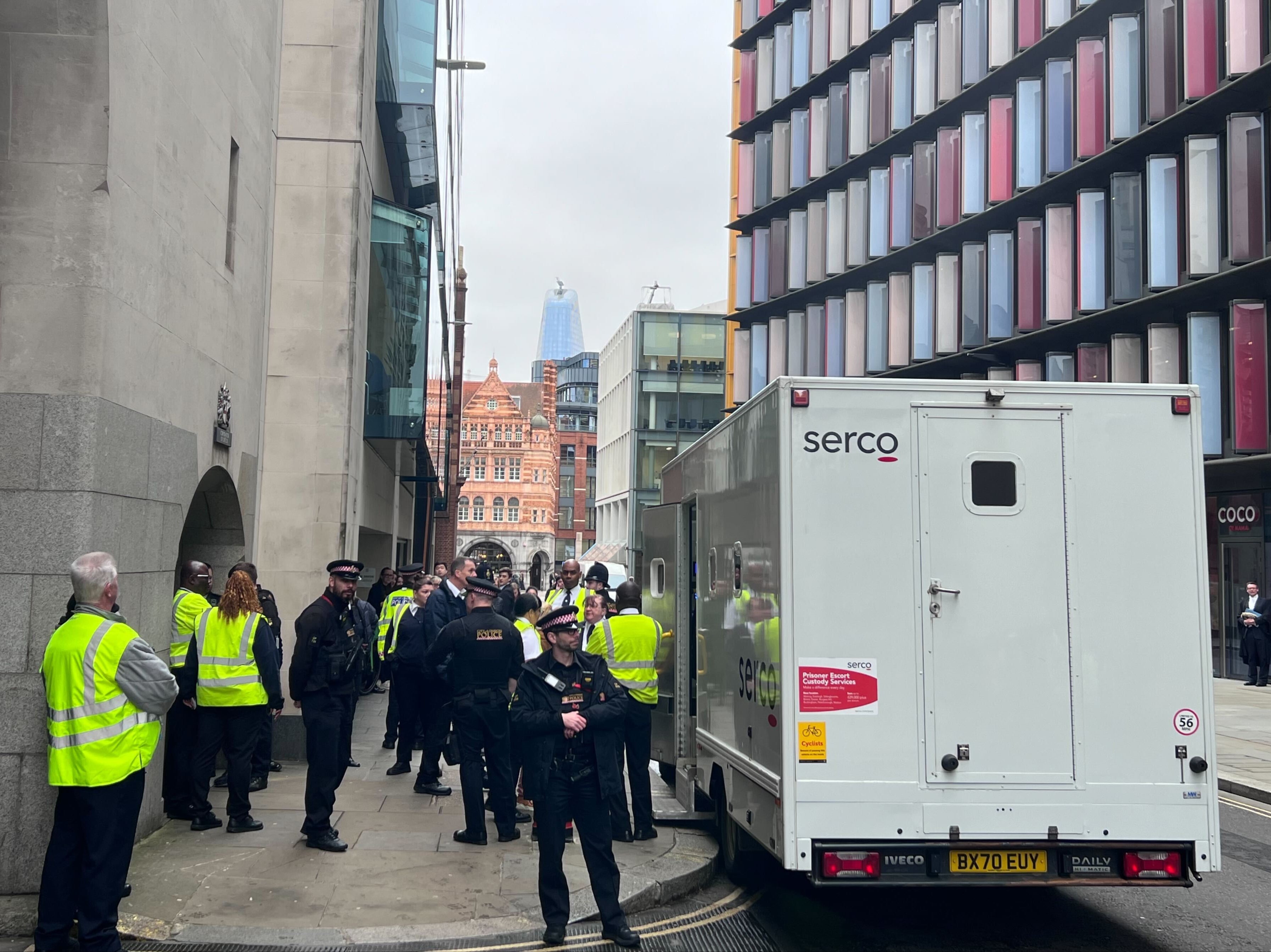 Defendants in custody were moved to prison vans after the court was evacuated