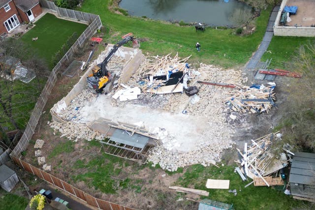 <p>Work taking place on Monday to demolish the unauthorised spa pool block</p>