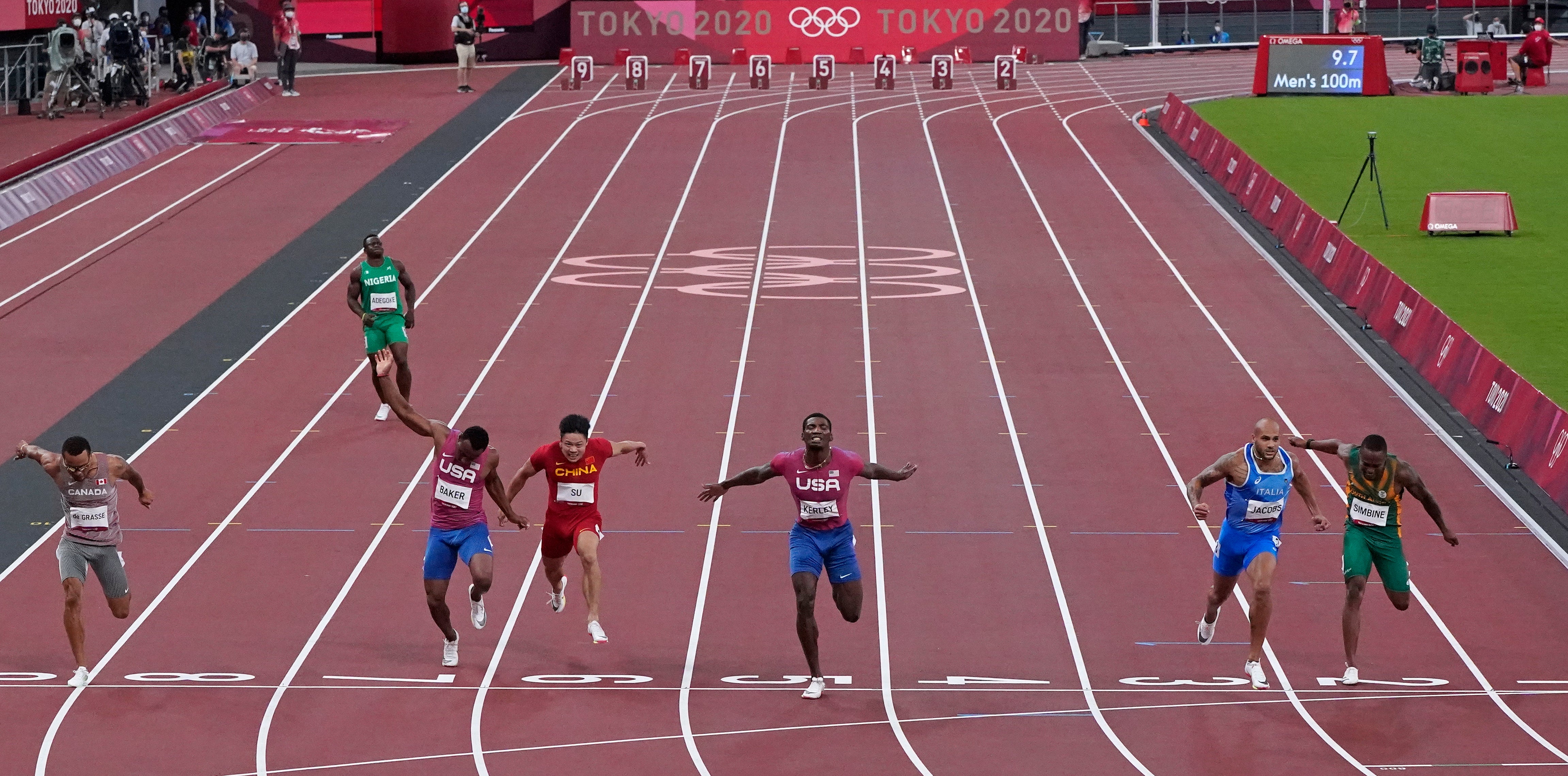 Lamont Marcell Jacobs, of Italy, second right, crosses the line to win the gold medal in the final of the men's 100-meters at the 2020 Summer Olympics in Tokyo. The heat in Paris Olympics is expected to be worse than the last Olympics.