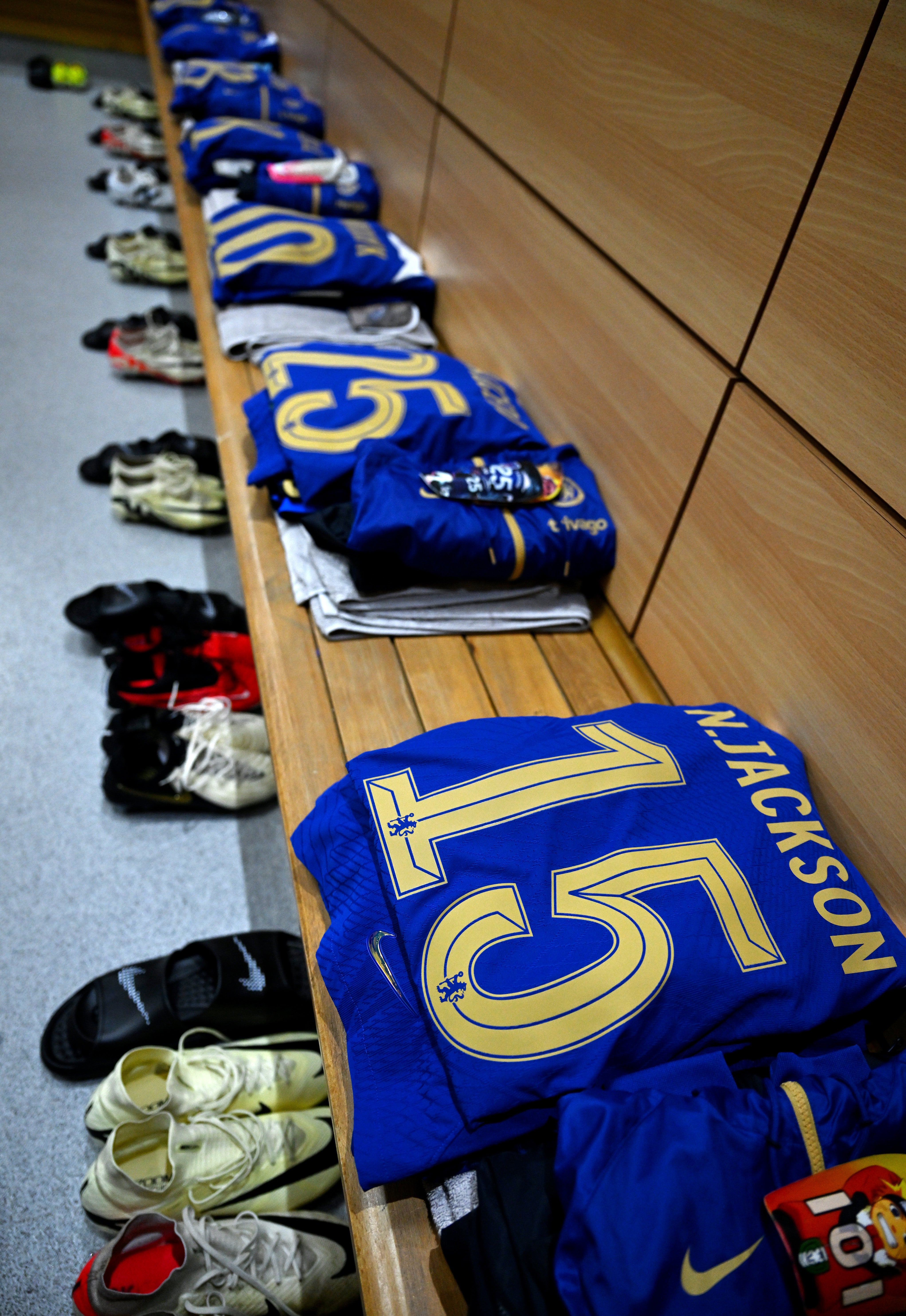 The player’s shirts are all laid out in the changing room