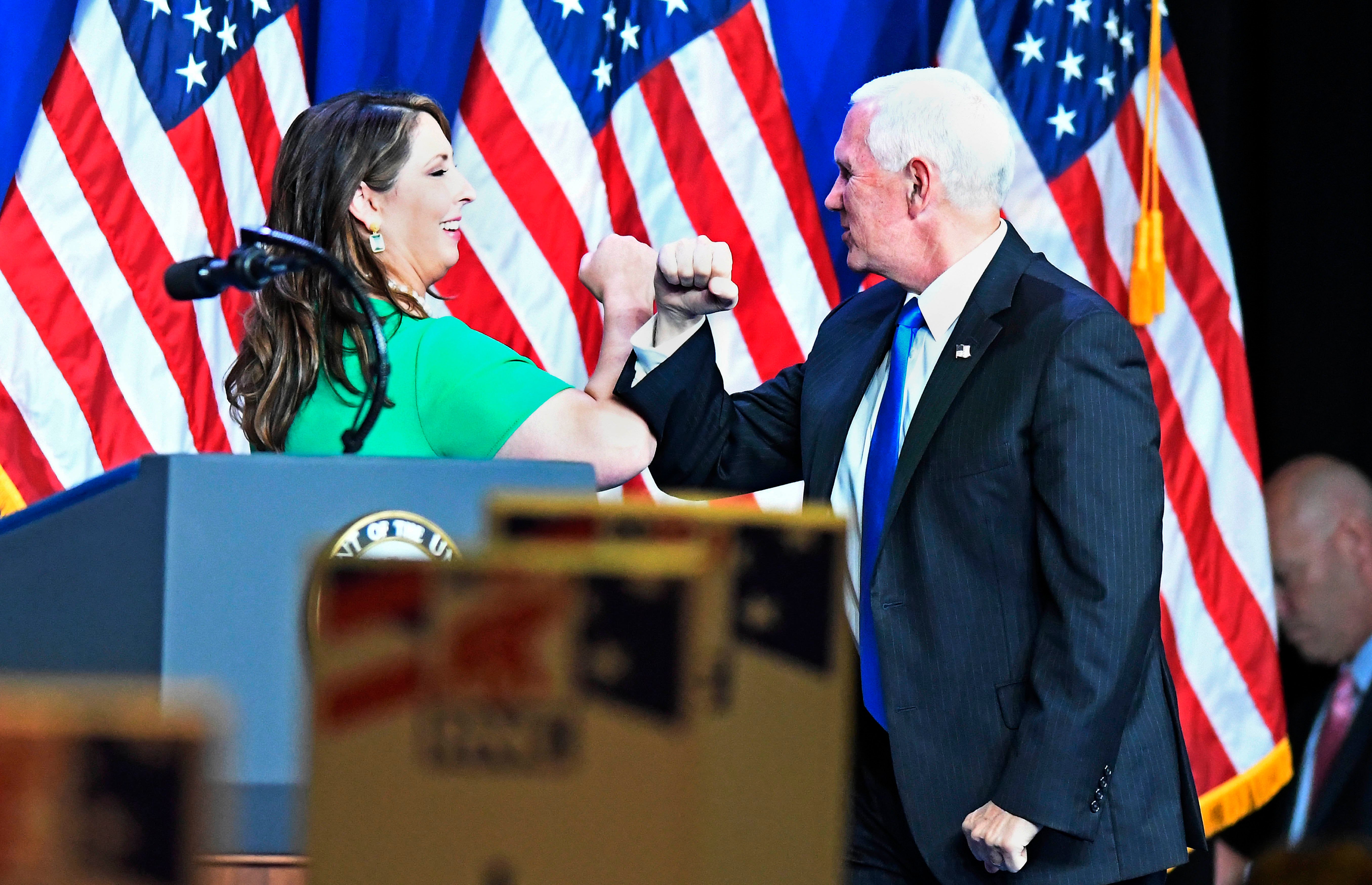 McDaniel greets Vice President Mike Pence on the first day of the Republican National Convention at the Charlotte Convention Center in August 2020