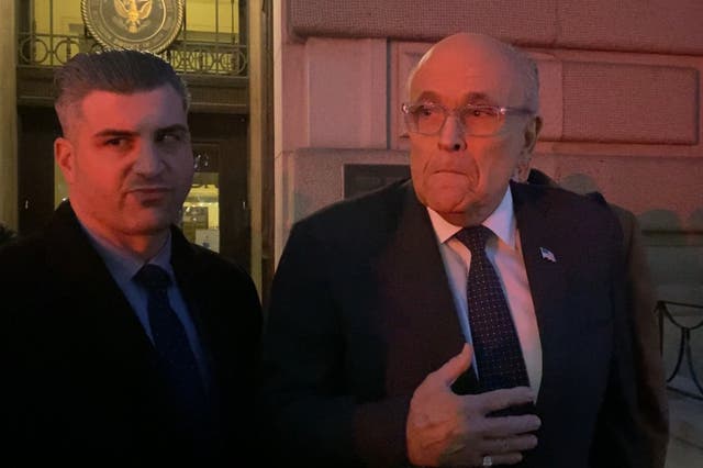 <p>Rudy Giuliani appears outside bankruptcy court in Manhattan on 7 February</p>