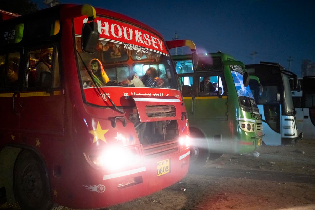 Woman falls through hole in bus in south India