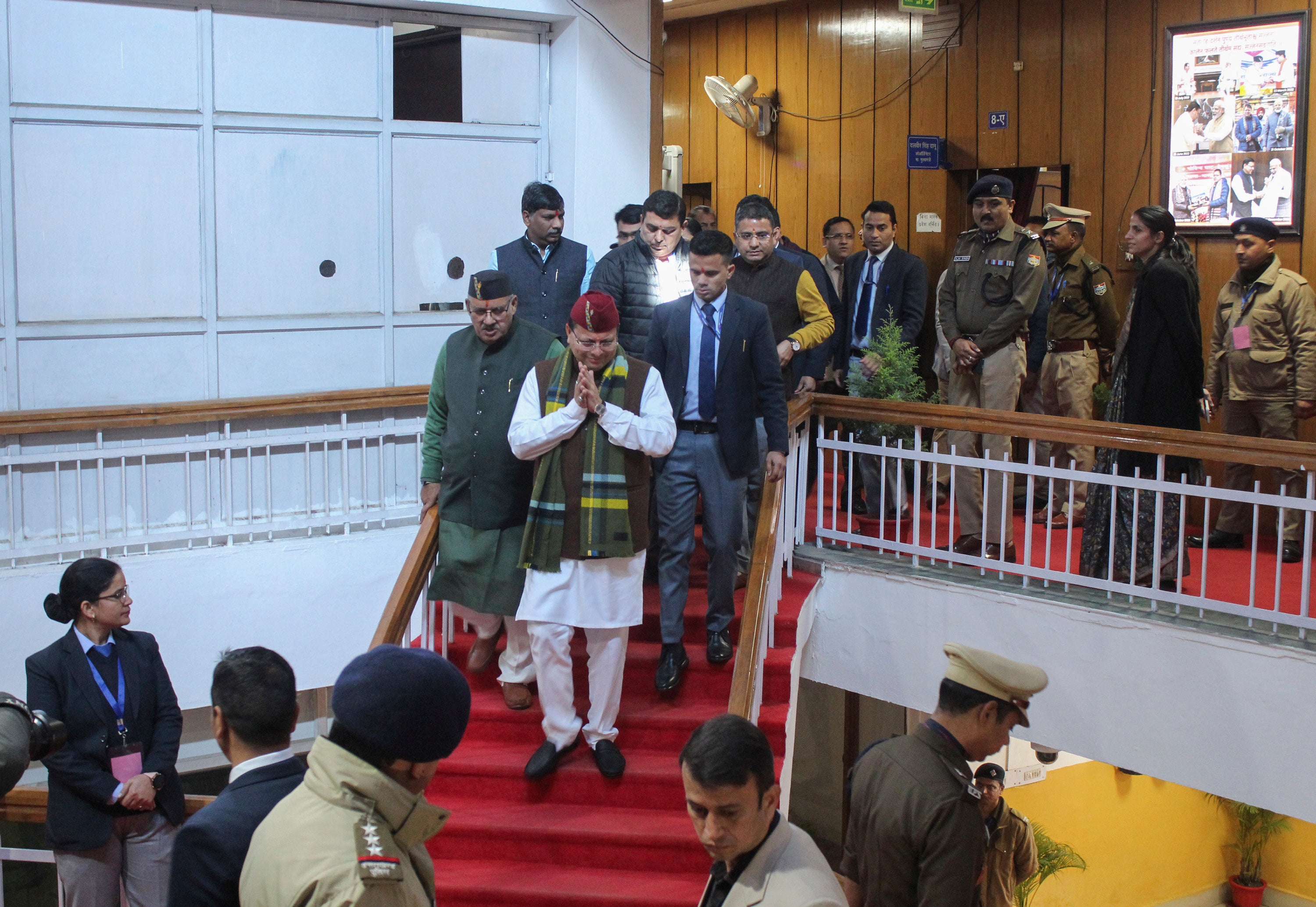 Uttarakhand Chief Minister Pushkar Singh Dhami, center, gestures as he arrives to attend a special session of the state assembly that passed a uniform marriage law for all religions in Dehradun