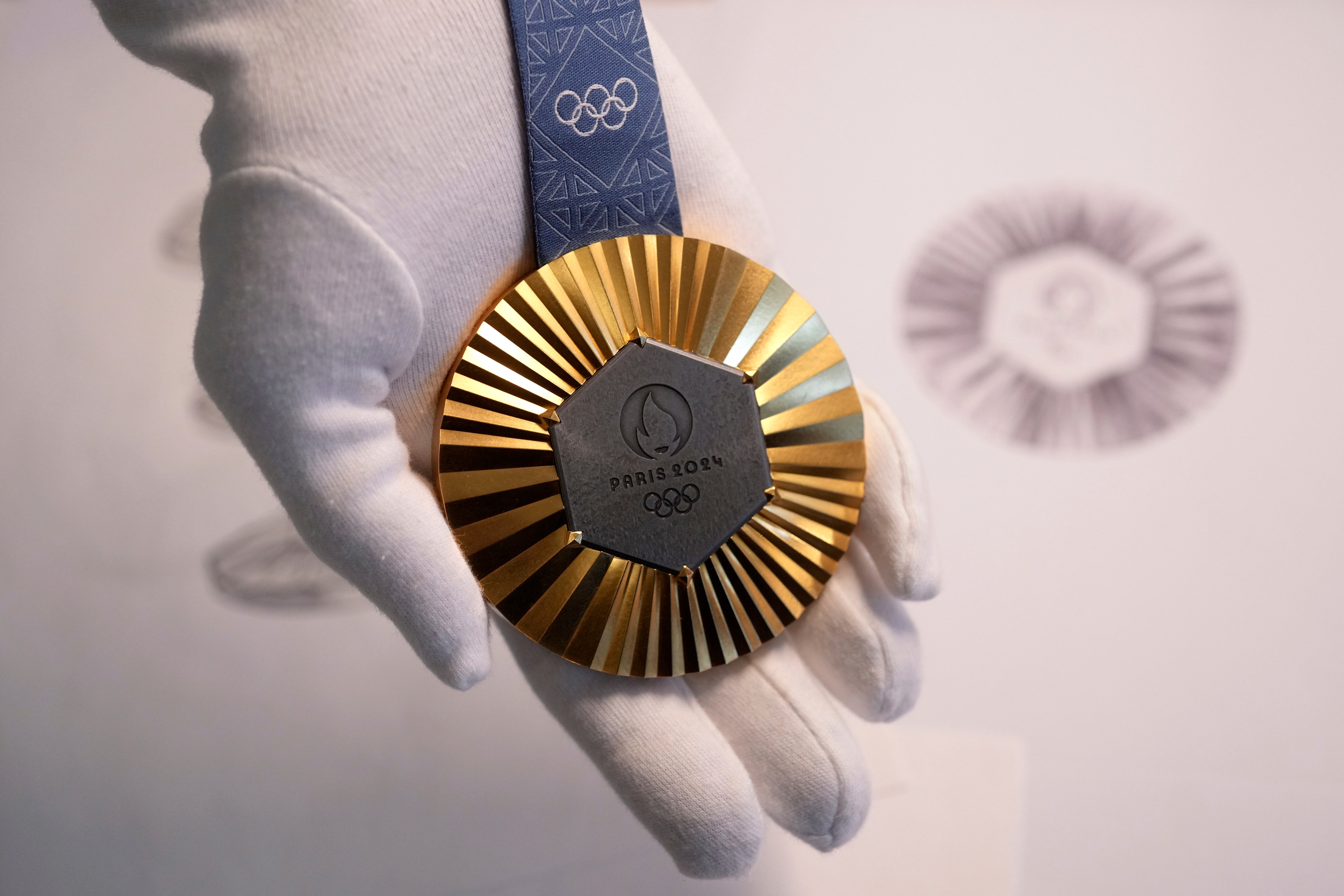 The Paris Olympics medals are monumental: They're made with metal chunks from the Eiffel Tower