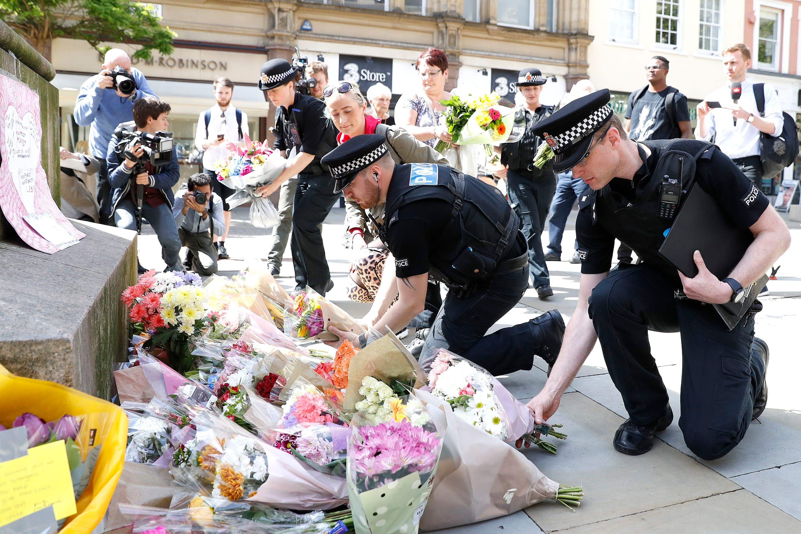 Flowers are left in Manchester in memory of the people who died in the bombing (Martin Rickett/PA)