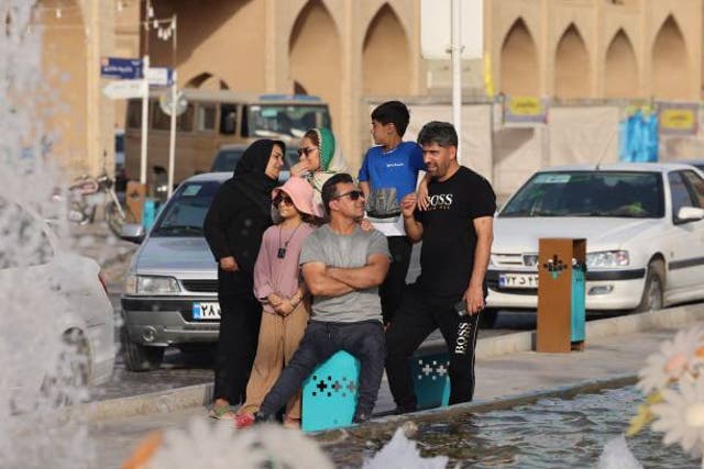 <p>Visitors rest in Iran’s central city of Yazd on 3 July 2023</p>