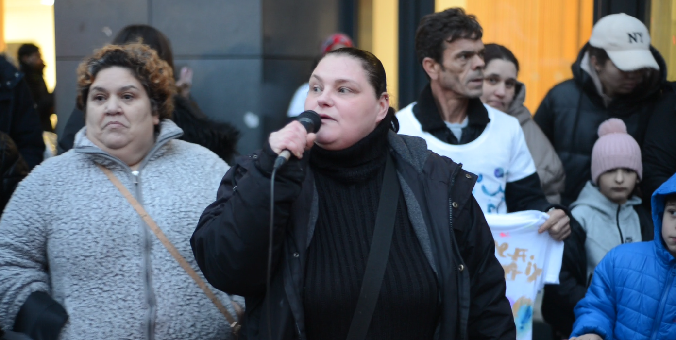 Milford Towers resident Kellie McKone speaking at a protest outside of Lewisham Council